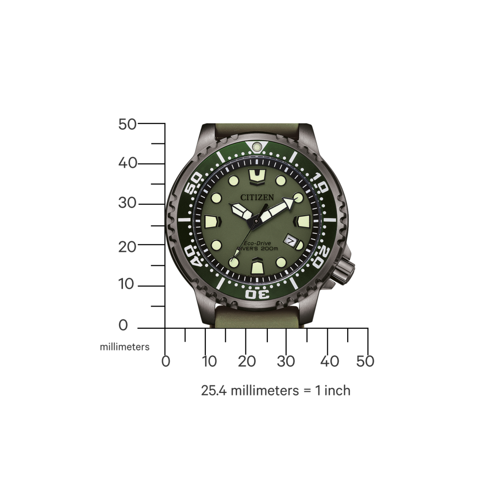 Montre Citizen avec cadran et bracelet verts, affichant l'heure et la date.