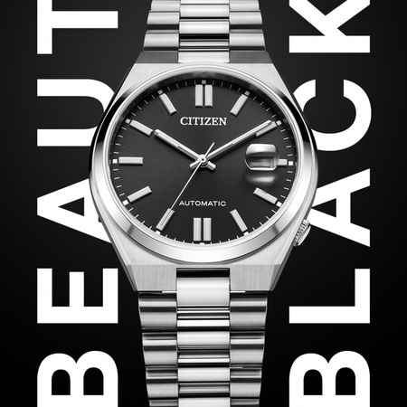 Montre Citizen avec cadran noir, bracelet argenté et les mots BEAUTY BLACK.