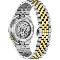 Montre Citizen avec un bracelet argenté et doré, montrant le mécanisme de la montre.