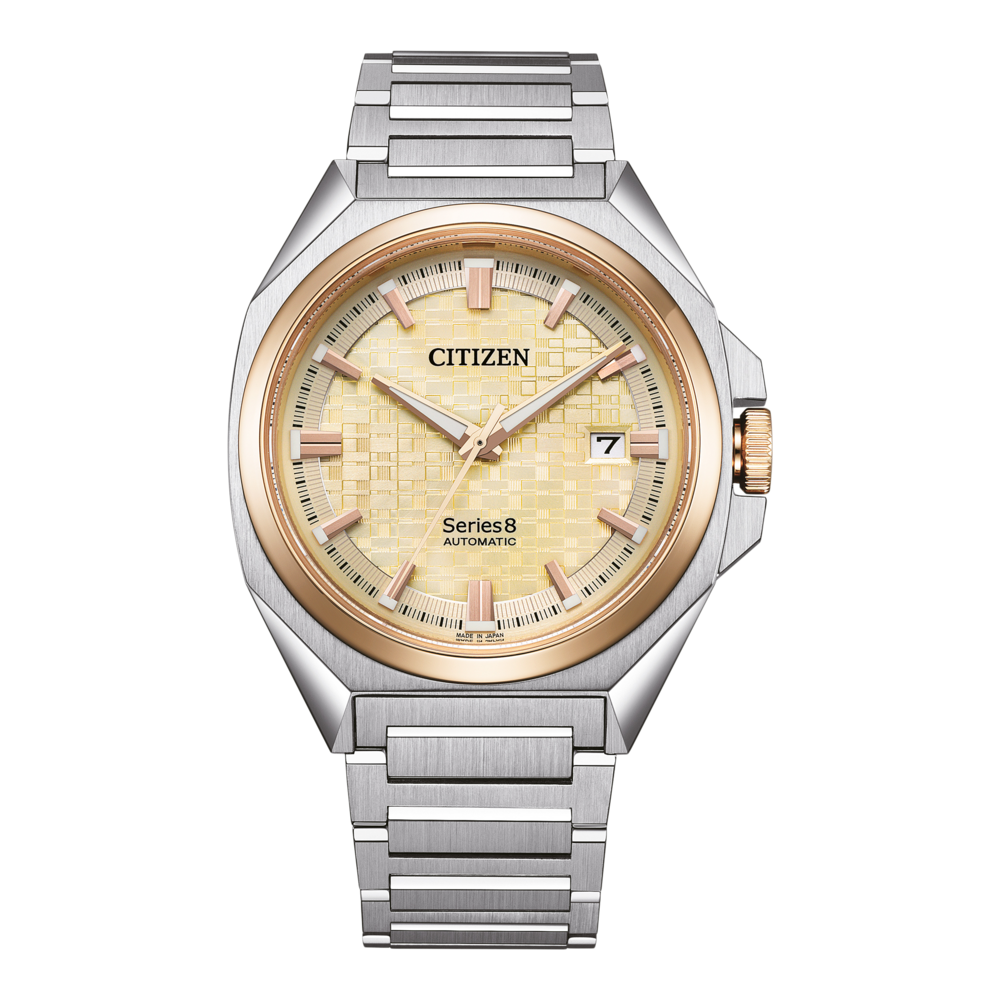 Montre automatique Citizen Series 8 avec des accents or et argent et un affichage de la date.