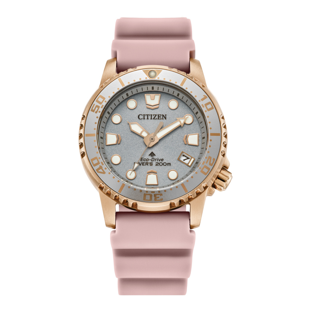 Montre Citizen avec bracelet rose et détails dorés, cadran gris.