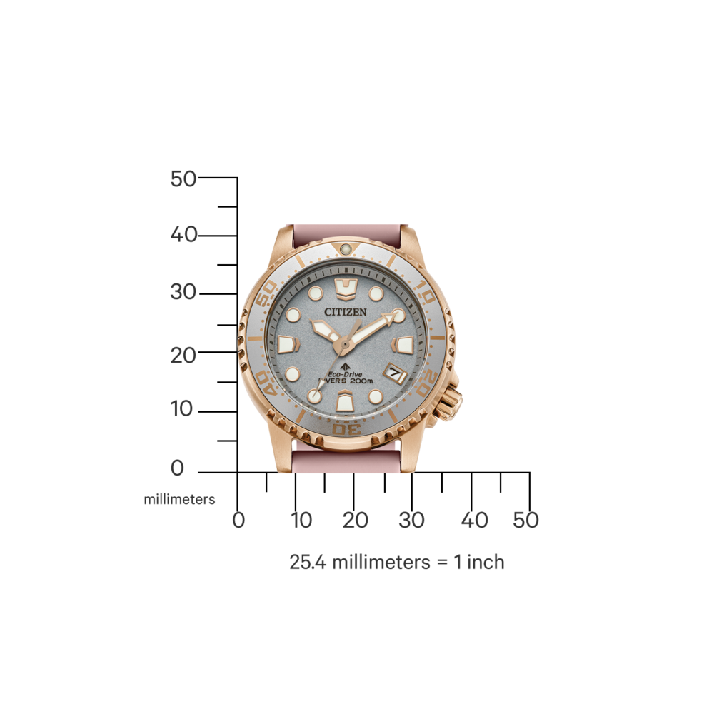 Montre Citizen avec bracelet rose et cadran gris, affichant l'heure.